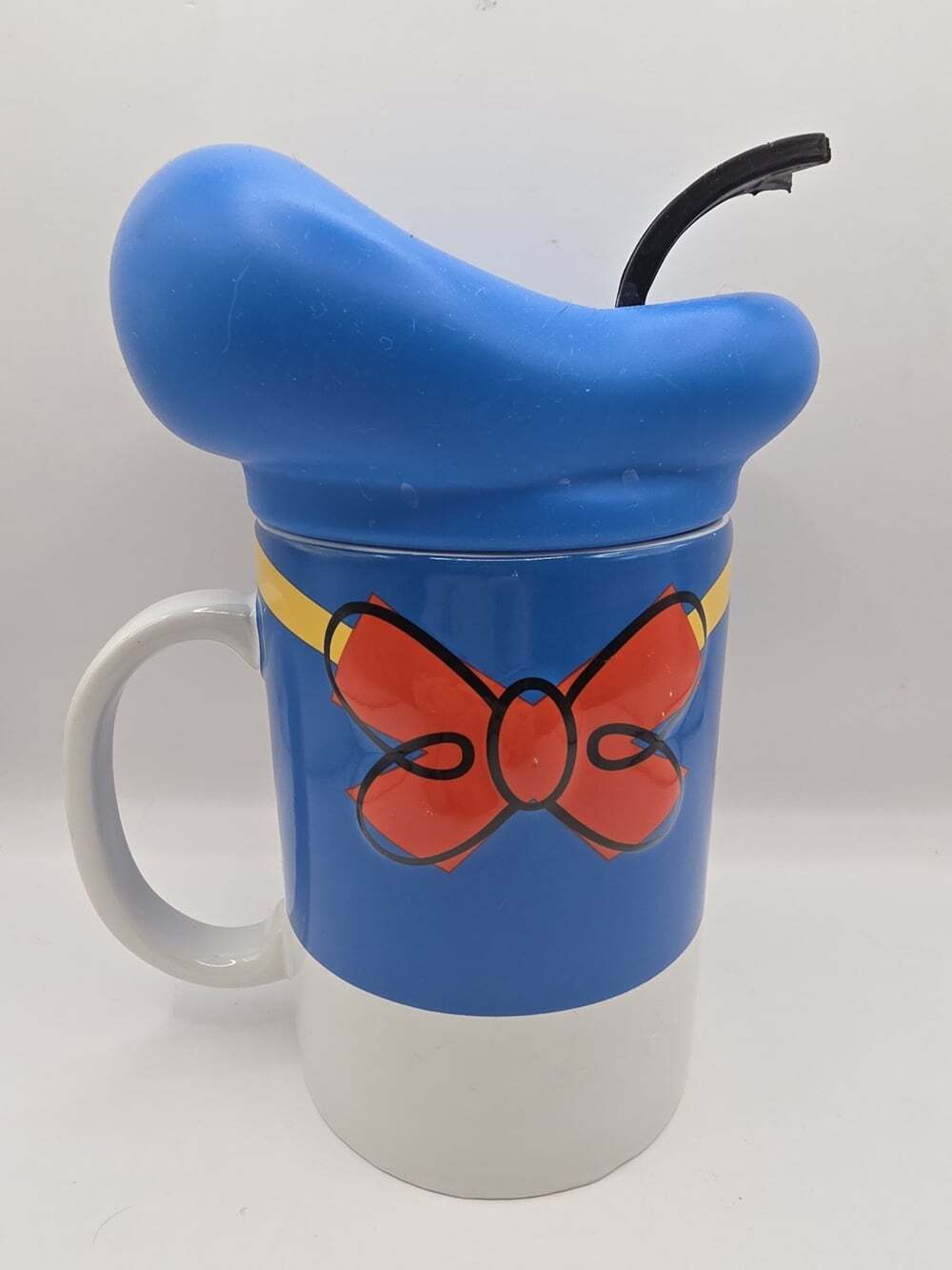 Disney Parks Donald Duck Ceramic 16oz Mug with Silicone Hat Lid